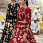 Red Raw Silk Bridal Lehenga Choli with Aari and Pearl Embellishments