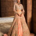 Peach Net Bridal Lehenga Choli with Front-Open Silhouette