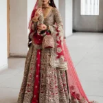 Scarlet Peshwas and Satin Silk Lehenga with Opulent Gold Embellishments