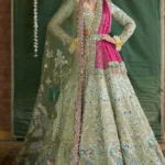 Aqua Raw Silk Lehenga Choli with Gold & Pink Dupattas