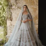 Ivory Net Pishwas and Lehenga Ensemble