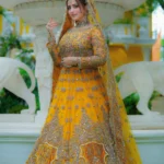 Golden Amber Bridal Lehenga with Zardozi & Crystal Embellishment