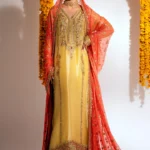 Elegant Yellow Mehndi Kameez with Embellished Trousers and Peach Dupatta