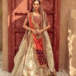 Ivory Gold Bridal Lehenga with Multicolor Border & Crimson Dupatta
