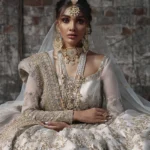 Ivory Long-Tailed Lehnga with Zardozi Embellishments